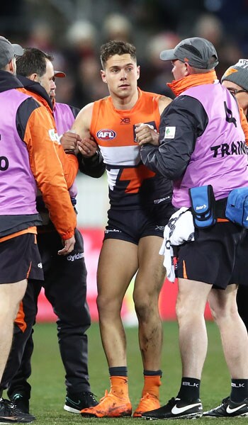 SLIDER-RD23REHABREPORT.png Josh Kelly is helped from the ground in round 21. The midfielder is on track to return for Sunday's clash with Melbourne. - GWS Giants,AFL,Josh Kelly